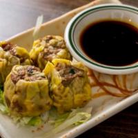 Thai Dumplings (4Pcs) · Minced Meat, sweet ginger-soy sauce.