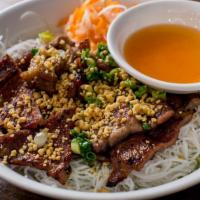 Grilled Pork Vermicelli Noodle · Grilled pork served on rice vermicelli w. shredded lettuce, cucumber, bean sprout, top with ...