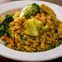 Vegetable Coconut Turmeric Fried Rice · Hot & spicy. Long beans, cabbage, cucumbers, eggs.