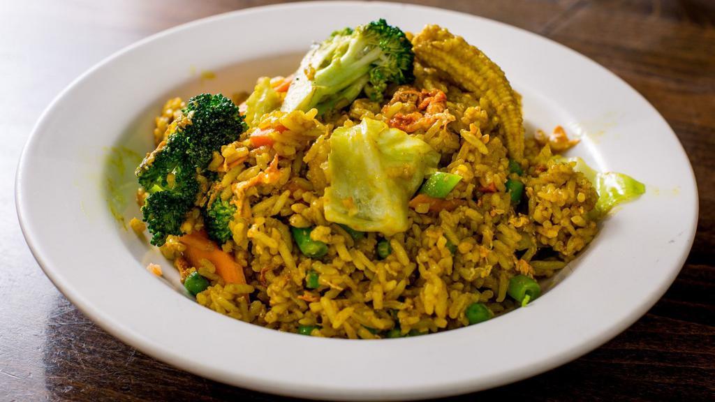 Vegetable Coconut Turmeric Fried Rice · Hot & spicy. Long beans, cabbage, cucumbers, eggs.