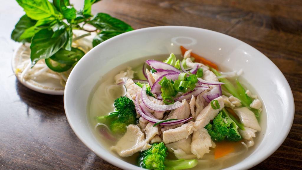 Pho Ga / Chicken Noodle Soup · Chicken with broccoli, sliced carrot, celery & jalapeno in noodle soup.