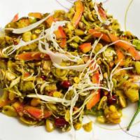 Tea Leaf Salad · Fermented tea leaf, mixed crunchies, lime, tomato garlic, fish sauce chili, cabbage.