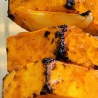Paneer Tikka · Delicious curry prepared with grilled cottage cheese and a mix of traditional Indian spices....