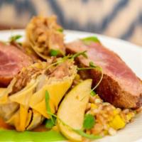 Duck Duo* · seared breast, confit leg spring roll, farro, edamame, 
corn, apricot coulis, pickled apples...
