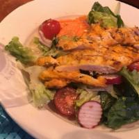 Grilled Chicken Salad · With romaine lettuce, tomatoes, red onions, carrots, peppers and radishes with vinaigrette a...