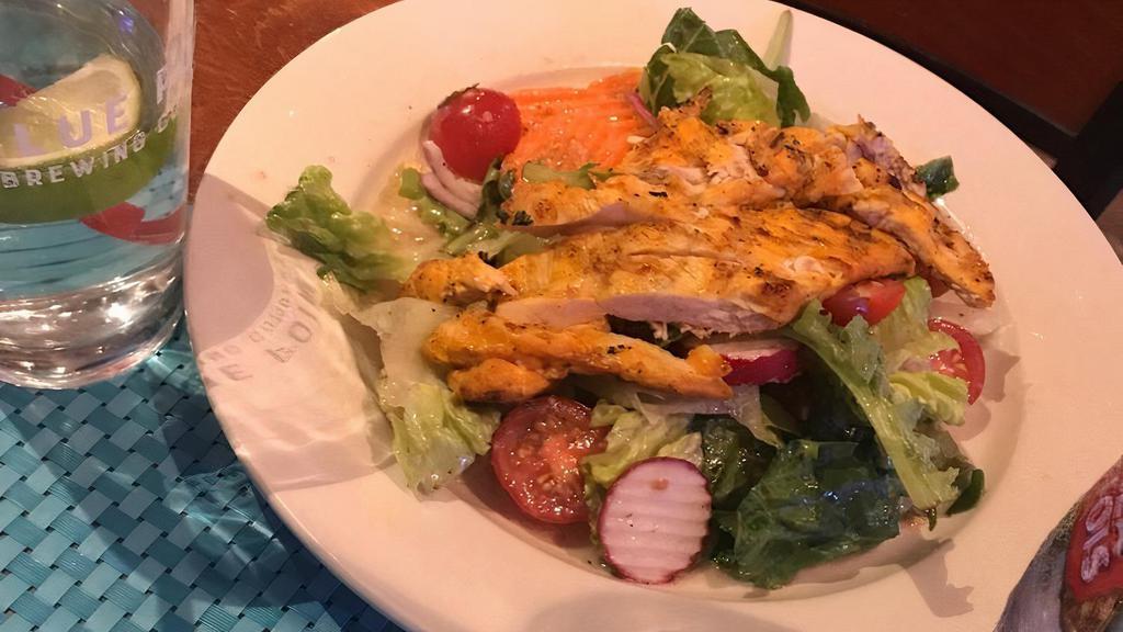 Grilled Chicken Salad · With romaine lettuce, tomatoes, red onions, carrots, peppers and radishes with vinaigrette and garlic dressing.