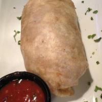 Chicken Burrito · Popular menu item. Pollo. Flour tortillas stuffed with rice, beans, pico de gallo, guacamole...