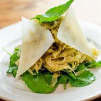 Finely Sliced Fennel Grated Piave Salad · Cheese and arugula leaves.