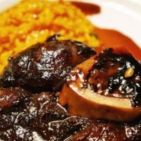 Saturday - Osso Buco · Brasied veal shank served over risotto Milanese.