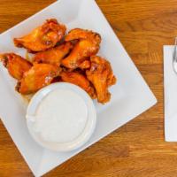 Baby Chicken Wings · Baby chicken wings tossed in your choice of Asian style sweet and sour, BBQ, or buffalo sauc...