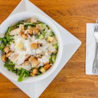 Classic Caesar Salad · Fresh romaine lettuce tossed with homemade croutons and Caesar dressing.