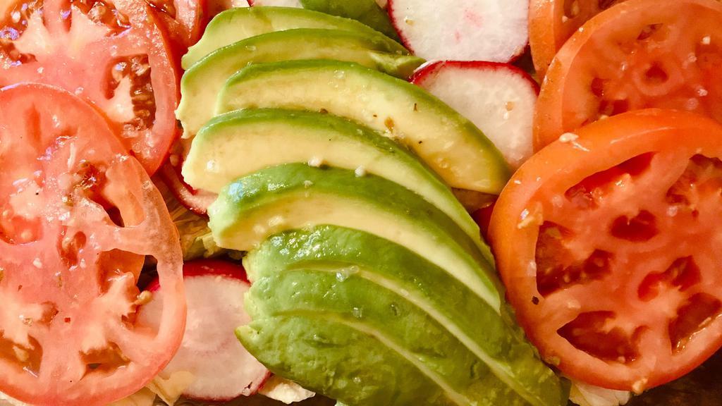Garden Salad · iceberg lettuce, avocado, red onions, peppers, lite vinaigrette dressing