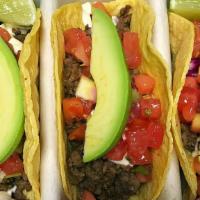 Tacos De Picadillo | Ground Beef · 3-pc soft tacos with angus ground beef, crema, pico de gallo, avocado, aji sauce, side of sp...