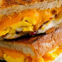 Bodega Breakfast Sandwich · fried bacon, scrambled eggs, american cheese, toast white bread, salsa rosada,
