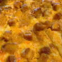 Buffalo Chicken Pizza · Medium spice Buffalo sauce base with mozzarella cheese and topped with breaded chicken.