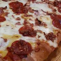 Sweet Sicilian Pizza · Pizza sauce and grande mozzarella topped with pepperoni and bacon, finished with a honey gar...