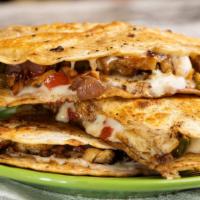 Chicken Quesadillas · Grilled chicken, onions, green peppers, mozzarella cheese and a side of sour cream.