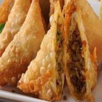Chicken Samosa · Ground chicken filled in crispy pastry and fried.