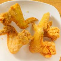 Fried Chicken Wing · Four pieces.