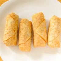 Roast Pork Egg Roll · One piece.