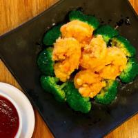 Crispy Prawns · Hot and spicy. Crispy jumbo shrimp and broccoli with hot chili sauce.
