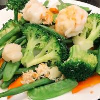 Gourmet Garden · Jumbo shrimp, scallops, squid with snow peas, straw mushrooms, broccoli, water chestnuts, an...