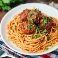 The Spaghetti & Meatballs · Fresh made marinara, savory beef meatballs, parmesan cheese, and basil sitting on a bed of f...