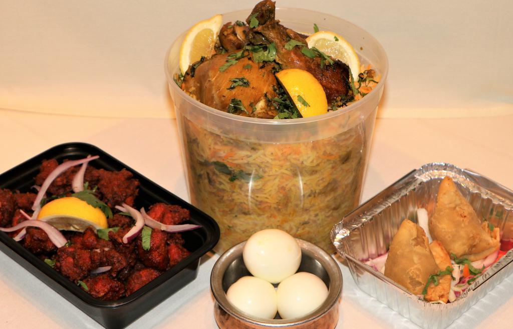 Biryani Bucket Meal Pack  -  Fri,Sat,Sun Only · Bucket of Biryani ( Veg. or Chicken) + Starter (Mini Samosa) + Dessert of the day + Soda