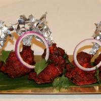 Chicken Lollypop · Chicken wings marinated in chef’s special masala and deep fried.