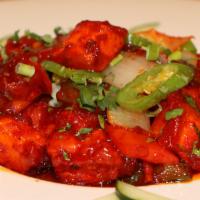 Chilli Paneer · Indian cottage cheese tossed in hot chili sauce with onions and green bell peppers.