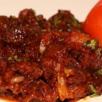 Gobi Manchurian · Fresh florets of cauliflower battered, fried and cooked with bell pepper, onion and Manchuri...