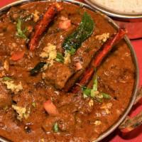 Lamb Chettinad · Soft tender chunks of lamb cooked with south indian style onion tomato gravy and chettinad s...
