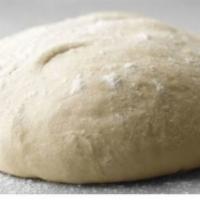Pizza Dough · Sour pizza dough made from natural starter.  Will make 12