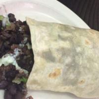 Giant Burrito · Favorite. Made with a large flour tortilla, filled with rice, beans, tomatoes, sour cream, c...