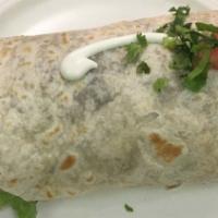 Vegetarian Burrito · With mushrooms, green peppers, spinach, onions and carrots.