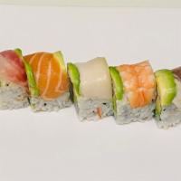 Rainbow Roll (Special) · California with tuna, salmon, yellowtail & avocado on top.