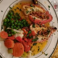 Twin Lobster Tails · With Yellow Rce,French Fries And Vegetable