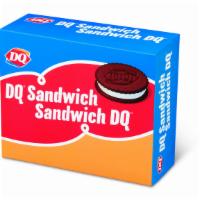 Dq® Sandwich (6 Pack) · Cold, creamy DQ® vanilla soft serve, nestled between two chocolate flavored wafers.