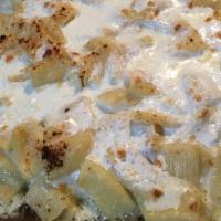 Baked Pasta With Alfredo Sauce · Choice of pasta tossed in the lore alfredo sauce and baked.