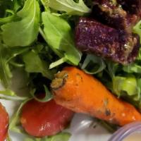 Roasted Vegetable Salad · Gluten-free. Chef-inspired root vegetables, arugula, chive pistou, lemon-lime vinaigrette