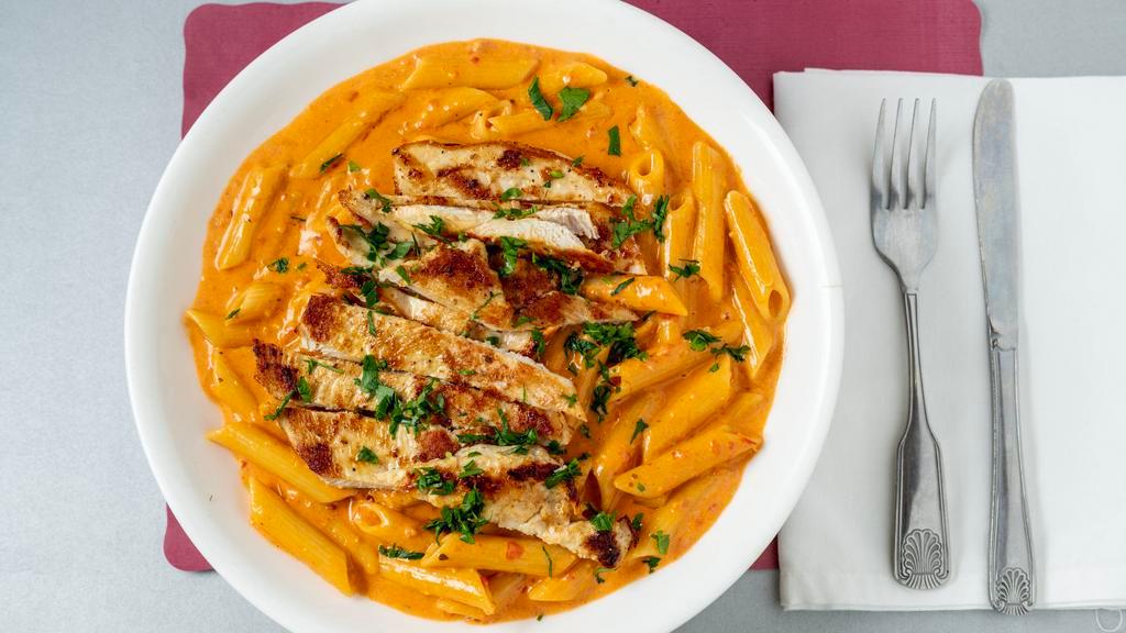 Penne Vodka · On pink sauce with touch of vodka. Served with soup or salad.