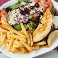Gyro Platter · On a pita bread with French fries, and Greek salad.