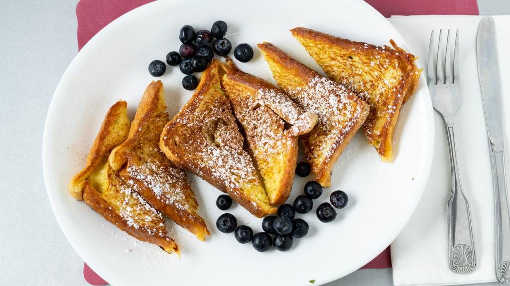 French Toast · Served with butter and syrup.