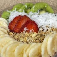 Tropical Açaí · Blended: Açai, almond milk, strawberries and banana Toppings: Coconut flakes, Strawberries, ...