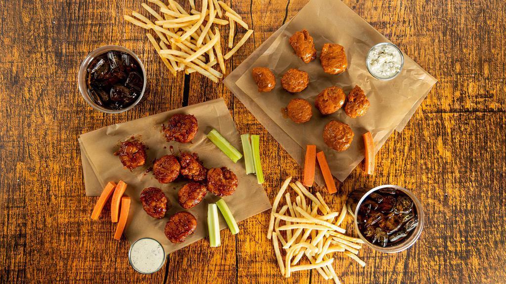 Boneless 16-Count Party Pack · 16 count order of boneless wings tossed in up to 2 different flavors or naked with up to 2 different flavors on the side. Comes with 2 servings of classic fries, 2 drinks, carrots & celery, and 2 dipping sauces of your choice.