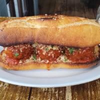 Meatball Parm Hero · Beef and Veal meatballs, Parmesan cheese on a Hero.