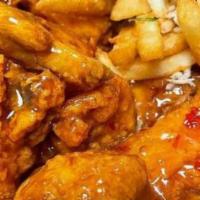 Chicken Wing Basket · Fried Chicken Wings served with Fries.