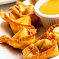 Wontons · Order of 8 pieces. Pick your wonton choice! Paired with our dipping sauce.