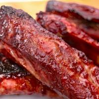 B-B-Q Spare Ribs · Ribs that have been broiled roasted or grilled.