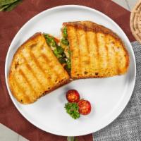 Join The Club Chicken Panini · Grilled chicken, lettuce, tomato, bacon, and muenster cheese on your choice of toasted bread.